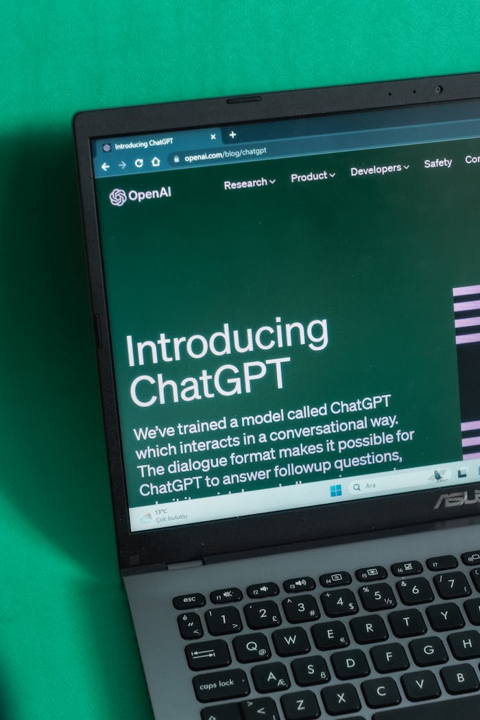 creative-01 Laptop screen displaying the introductory page of ChatGPT on OpenAI's website.